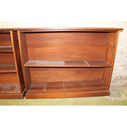 564 - Pair of mahogany open bookcases, 123cm long. (2)