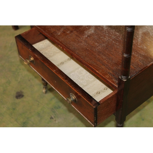 566 - Antique rosewood étagère with base drawer raised on turned supports capped by castors, 43cm wide.