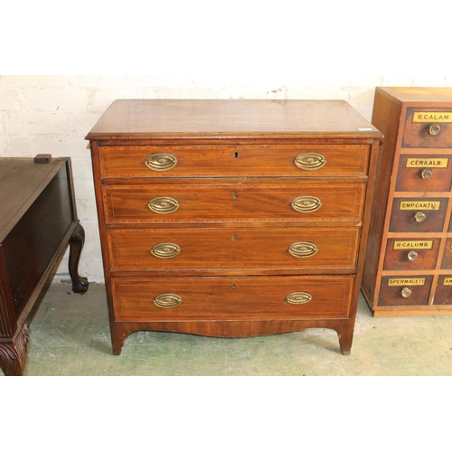 569 - Antique mahogany crossbanded and string inlaid bachelors chest of four drawers, raised on bracket fe... 