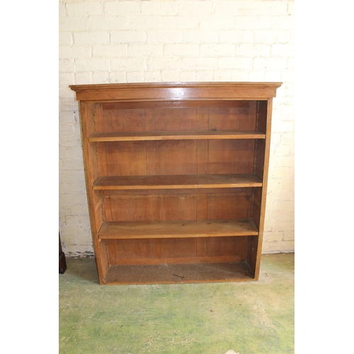 570 - Oak open bookcase, 122cm long.