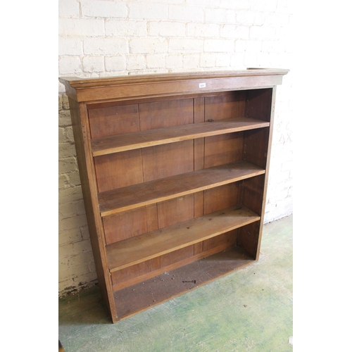 570 - Oak open bookcase, 122cm long.