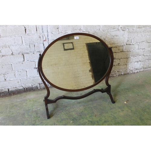 577 - Large mahogany swing dressing glass, 82cm long.