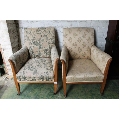 580 - Pair of 19th century lounge chairs raised on square tapering supports, 88cm x 66cm.