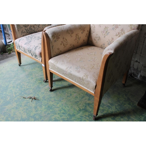 580 - Pair of 19th century lounge chairs raised on square tapering supports, 88cm x 66cm.