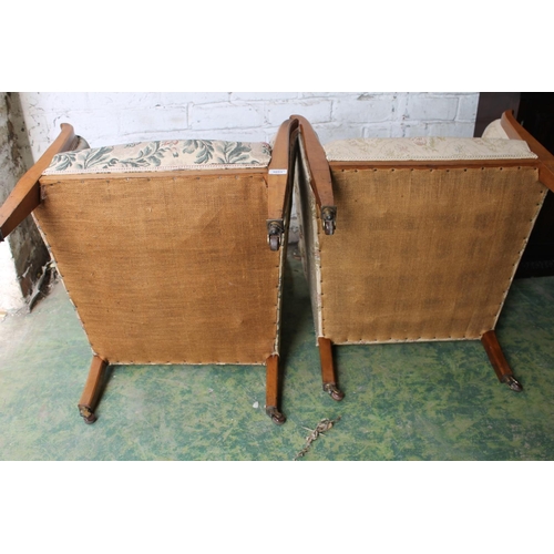 580 - Pair of 19th century lounge chairs raised on square tapering supports, 88cm x 66cm.