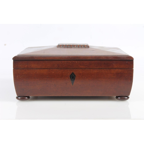 449 - 19th century mahogany sewing box of sarcophagus form with fitted interior, raised on bun feet, 26cm ... 