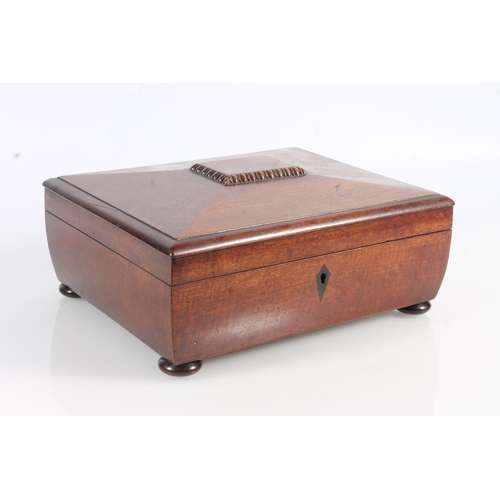 449 - 19th century mahogany sewing box of sarcophagus form with fitted interior, raised on bun feet, 26cm ... 