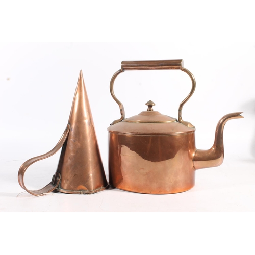 451 - Copper metal ware to include mulling cone, kettle and a graduated set of three harvest measure jugs.... 