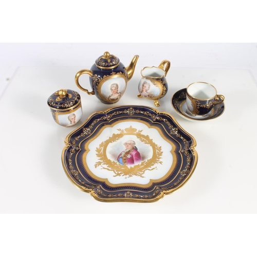 458 - Sevres Chateau de Fountainbleau porcelain breakfast set comprising circular tray, teapot, sugar bowl... 