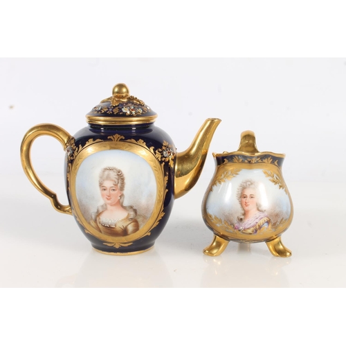 458 - Sevres Chateau de Fountainbleau porcelain breakfast set comprising circular tray, teapot, sugar bowl... 