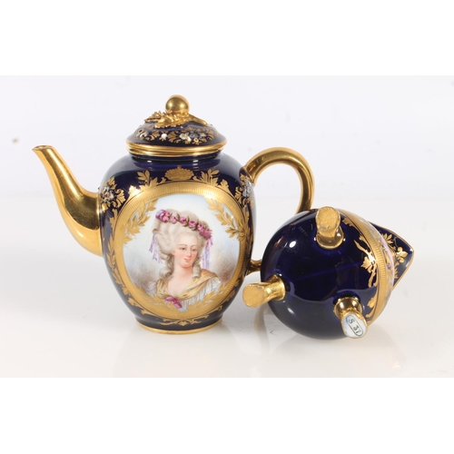 458 - Sevres Chateau de Fountainbleau porcelain breakfast set comprising circular tray, teapot, sugar bowl... 