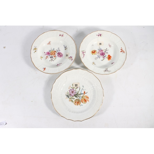 469 - Pair of Meissen style soup plates having gilt rim and imitation basket weave borders framing hand pa... 