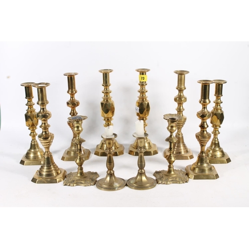 478 - Brass Diamonds candlesticks to include Princess x2, others similar and other brass candlesticks. (12... 