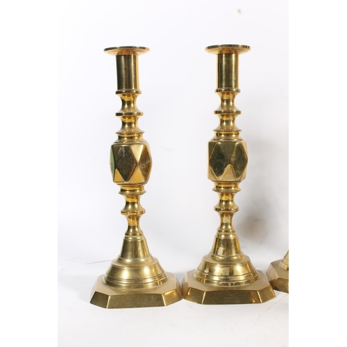 478 - Brass Diamonds candlesticks to include Princess x2, others similar and other brass candlesticks. (12... 