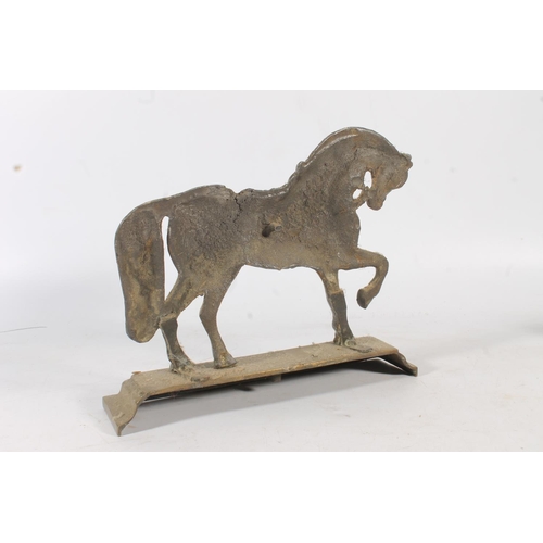 484 - Cast iron door stop in the form of a lion, and another in the form of a horse, a scarab beetle boot ... 