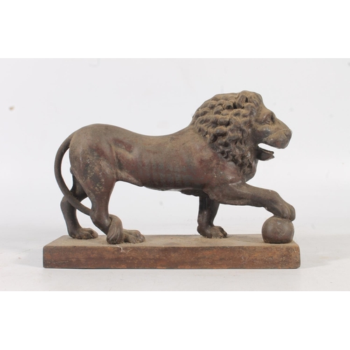 484 - Cast iron door stop in the form of a lion, and another in the form of a horse, a scarab beetle boot ... 