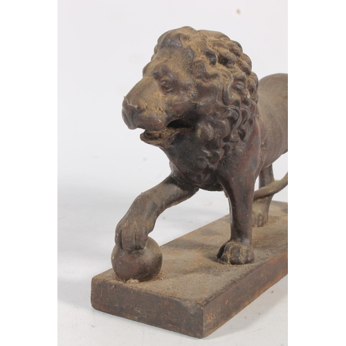 484 - Cast iron door stop in the form of a lion, and another in the form of a horse, a scarab beetle boot ... 