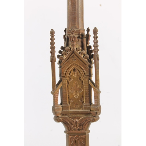 487 - Pair of gilded brass candlesticks in the Gothic ecclesiastical Puginesque style, 43cm tall.