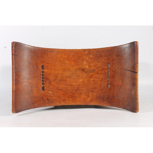 545 - Antique hardwood stool in the form of an African Ashanti neck rest, 47cm wide.