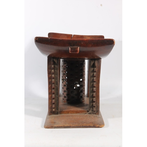 545 - Antique hardwood stool in the form of an African Ashanti neck rest, 47cm wide.