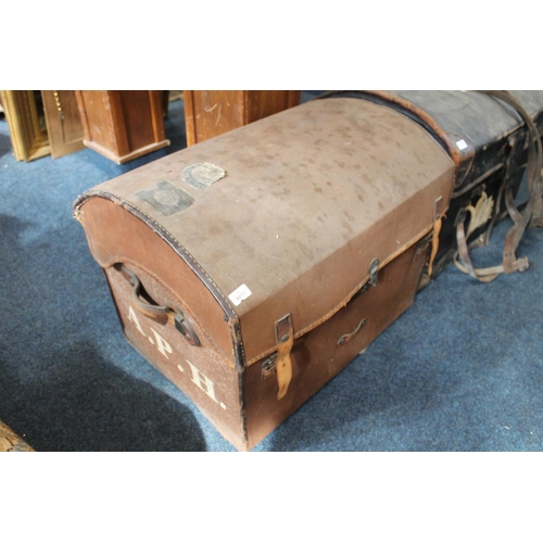 560 - Two dome topped steamer trunks. (2)