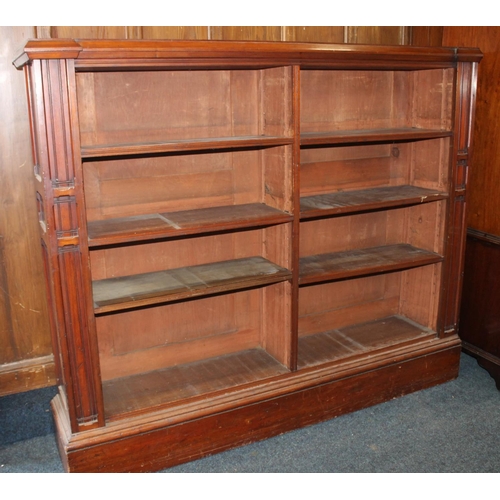 571 - Mahogany open bookcase in the Aesthetic movement style, 154cm long.