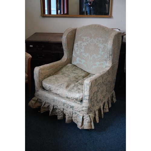 547 - Pair of 19th century wing armchairs with green relief floral design fabric covers, raised on mahogan... 