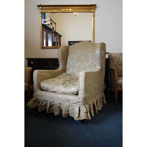 547 - Pair of 19th century wing armchairs with green relief floral design fabric covers, raised on mahogan... 