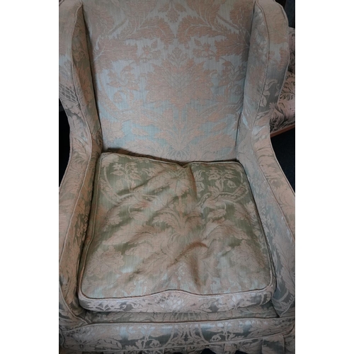 547 - Pair of 19th century wing armchairs with green relief floral design fabric covers, raised on mahogan... 