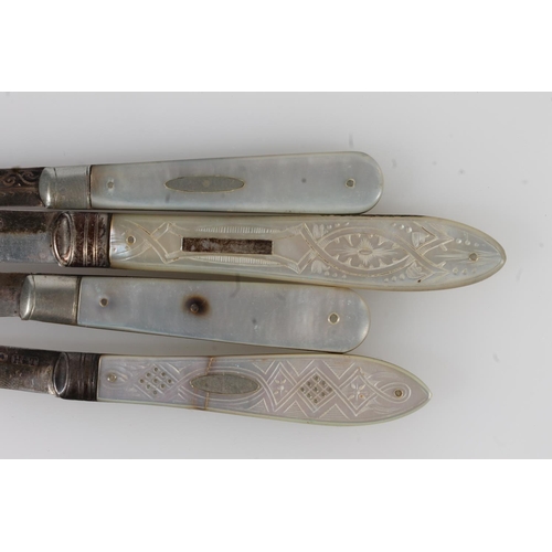 159 - Four antique silver bladed fruit knives with mother-of-pearl handles.