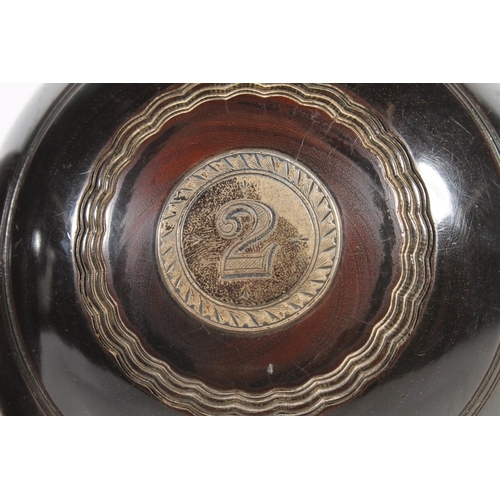 163 - Pair of lawn bowls with silver plaques inscribed 