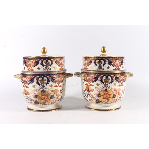 431 - Pair of Derby porcelain ice pails decorated in the Imari palate, 27cm tall.