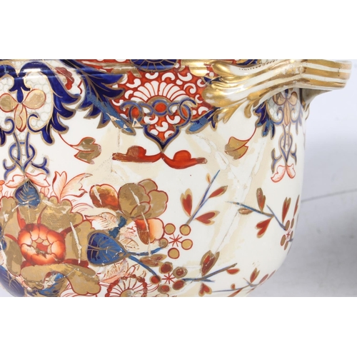 431 - Pair of Derby porcelain ice pails decorated in the Imari palate, 27cm tall.