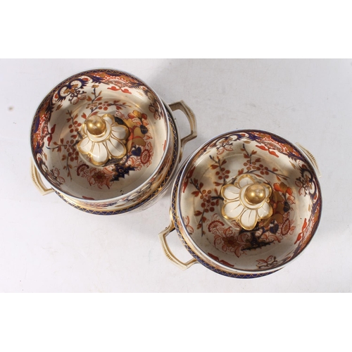 431 - Pair of Derby porcelain ice pails decorated in the Imari palate, 27cm tall.