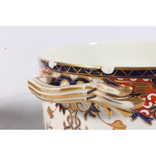 431 - Pair of Derby porcelain ice pails decorated in the Imari palate, 27cm tall.