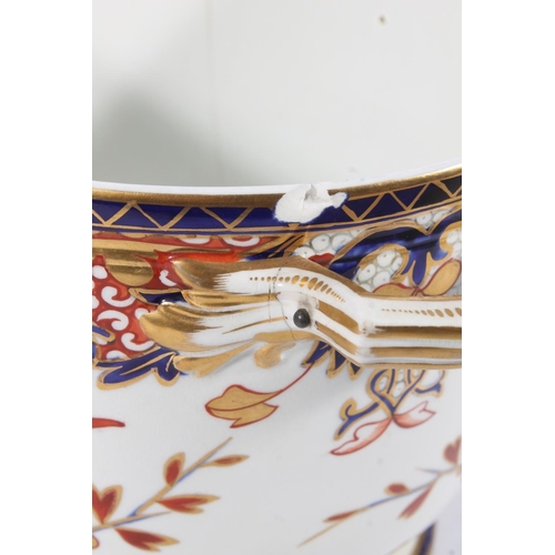 431 - Pair of Derby porcelain ice pails decorated in the Imari palate, 27cm tall.