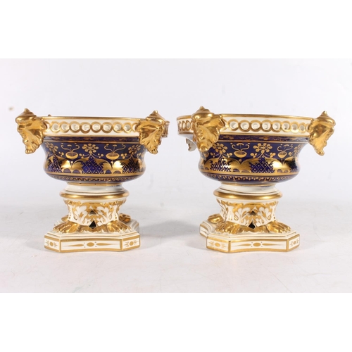 434 - 19th century porcelain to include: Derby Royal blue and gilt pot pourri vase (af). Two reticulated e... 