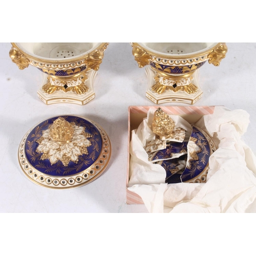 434 - 19th century porcelain to include: Derby Royal blue and gilt pot pourri vase (af). Two reticulated e... 