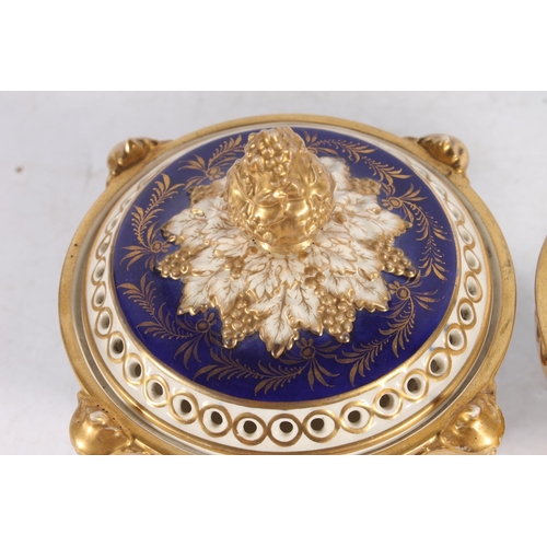 434 - 19th century porcelain to include: Derby Royal blue and gilt pot pourri vase (af). Two reticulated e... 