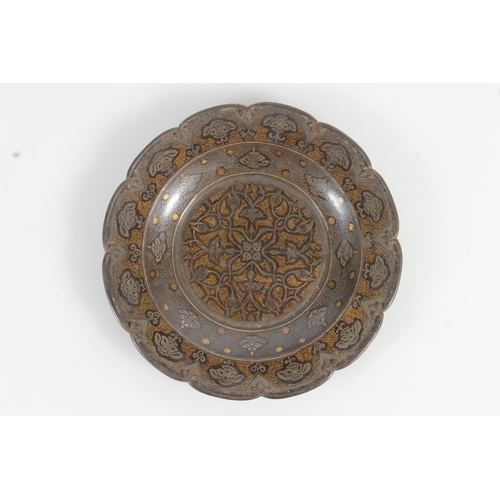 467 - Antique Eastern gold and silver damascene inlaid iron white metal dish, 20cm diameter.