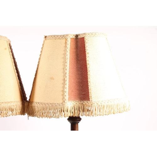 489 - Pair of mahogany fluted column table lamps, raised on fluted square platform base, 54cm tall to the ... 