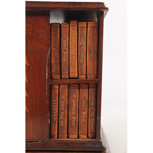 492 - Miniature mahogany and marquetry inlaid revolving bookstand with leather bound miniature Shakespeare... 