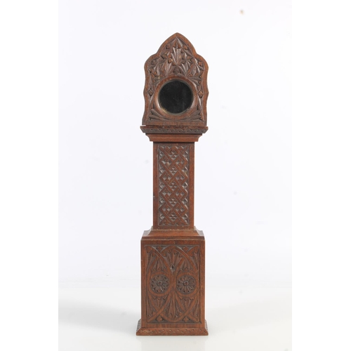 493 - Antique chip carved mahogany 'poor man's clock' pocket watch stand in the form of a miniature grandf... 