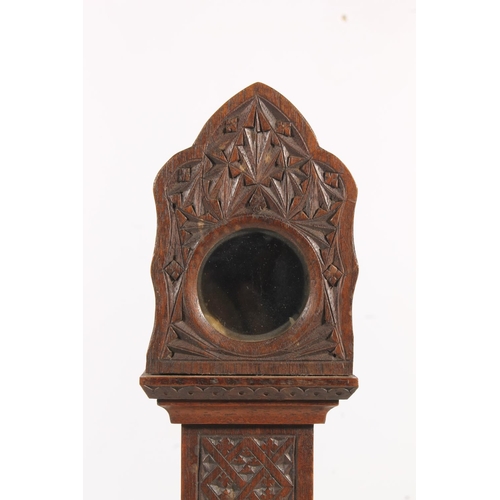 493 - Antique chip carved mahogany 'poor man's clock' pocket watch stand in the form of a miniature grandf... 