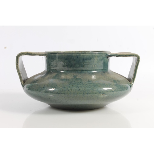 496 - Scottish Pottery, a Dumore mottled blue glazed squat two handled vase, impressed mark to the base, 1... 