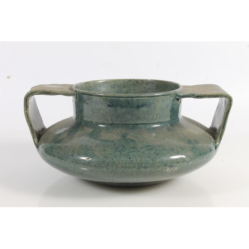 496 - Scottish Pottery, a Dumore mottled blue glazed squat two handled vase, impressed mark to the base, 1... 