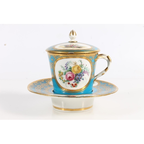 500 - French Sèvres porcelain chocolate cup and cover with matching stand having blue gilt borders and han... 