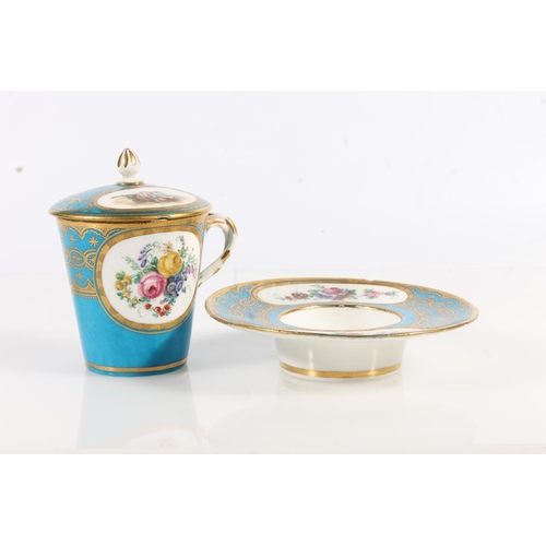 500 - French Sèvres porcelain chocolate cup and cover with matching stand having blue gilt borders and han... 