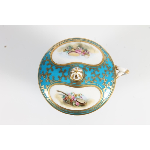 500 - French Sèvres porcelain chocolate cup and cover with matching stand having blue gilt borders and han... 