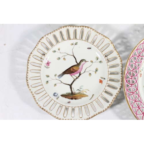 502 - Two 19th century Continental porcelain plates with reticulated border edges and hand painted bird de... 